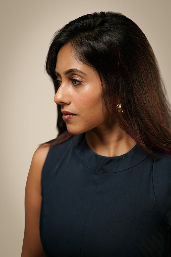 Teal sleeveless panel dress styled for everyday workwear — Ikigara